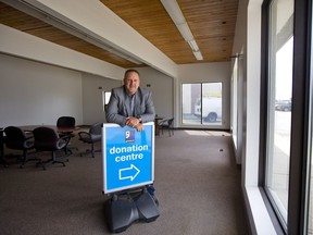 Scott Louch, chief operating officer for Goodwill Industries Ontario Great Lakes, stands in Goodwill's Hyde Park Road donation centre. Goodwill, in partnership with Fanshawe College, plans to open a retail operation at the site, featuring high-end fashions. (Mike Hensen/The London Free Press)
