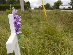 A cross from a previous deadly crash marks the intersection of Yorke Line and Belmont Road south of Belmont, where Michael Wodzinski died in 2016 in a collision in heavy fog. Tuesday, a motorcyclist was killed and another critically injured at the same intersection when they collided with a vehicle turning left onto Yorke Line. Mike Hensen/The London Free Press