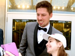 Logan Couture poses for a selfie with Eden Kleinschroth at his All in for Brain Research charity casino night at Centennial Hall in London Thursday.  Mike Hensen/The London Free Press/Postmedia Network