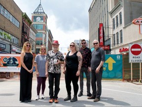 Dundas Place will be under construction a while longer, but a group of small business owners hope a community-organized street festival this weekend will encourage foot traffic in the meantime. From left to right: Natalie Bradshaw and Darlene David, co-owners of Filthy Rebena, Marvin Post, self-described trouble maker from Attic Books, Julie Kortekaas, co-owner of Rebel Remedy, Brian Cooke, manager of Jonathon Bancroft-Snell Gallery, and Jonathon Bancroft-Snell, the gallery's owner. CHRIS MONTANINI/LONDONER