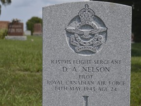 A new gravestone marks the final resting place of Dana Anthony Nelson, a flight sergeant. with the Royal Canadian Air Force. Nelson's original anonymous gravestone was replaced this year, more than 75 years after his plane went down in Lake Erie during a training exercise. (Louis Pin/Times-Journal)
