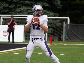 Western Mustangs quarterback Chris Merchant drops back to pass during an Ontario University Athletics football regular-season game against the Carleton Ravens at Carleton's MNP Park. Western won the contest 26-23 in overtime. Valerie Wutti/Carleton Ravens.