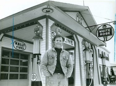 George Beaumont stands outside his replica White Rose gasoline station of the 1920s, 1988. (London Free Press files)