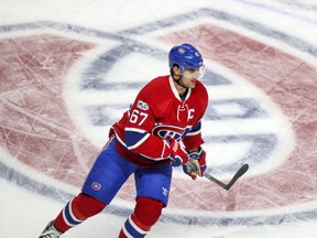 Max Pacioretty skates over CH crest at the Bell Centre during game.