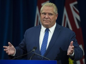 Premier Doug Ford  holds a press conference arguing against the judges ruling about slashing the size of City council  in Toronto, Ont. on Monday September 10, 2018. (Craig Robertson/Postmedia Network)