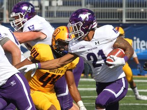 Western Mustangs running back Cedric Joseph rushed for 118 yards and a touchdown in Western's 26-23 win over the Queen's Gaels Saturday in Kingston. (Ian MacAlpine/The Whig-Standard)