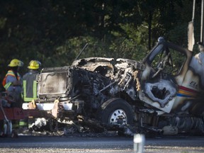 The charred remains of a transport truck on the westbound lanes of Highway 401 west of Orford Rd., is seen Wednesday, Sept. 12, 2018.  (Submitted Photo by Monica Fletcher)