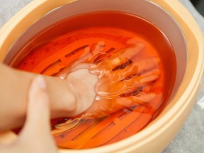 Paraffin hand bath can leave a stain on furniture but there’s a fix for that. (Getty Images)