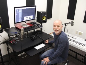 Alan Thomson, digital literacy facilitator with the London Public Library, sits at "The Studio," a new library space equipped to allow residents complete all types of audio projects. JONATHAN JUHA/THE LONDON FREE PRESS