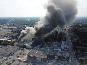 Smoke rises from a warehouse fire at 1370 Argyle Road in Windsor.