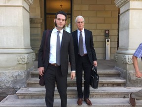 Brett Hueston and John Hueston of the Aylmer Express leave the Elgin County courthouse after arguments in their obstruction of justice trial. The pair were charged while trying to cover a car that went over the cliff into Lake Erie in June 2017. A decision in the case is expected on Oct. 22. (JANE SIMS, The London Free Press)