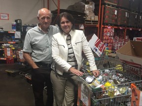 London Food Bank co-executive directors Glen Pearson and Jane Roy launch the 30th annual Thanksgiving food drive Thursday.