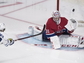 Maple Leafs forward Kasperi Kapanen scores on Canadiens goaltender Carey Price during the third period in Montreal on Wednesday. (Graham Hughes/The Canadian Press)