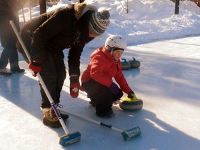 In January, Ailsa Schmitt of the Ilderton Curling Club was coaching curling outdoors in Victoria Park in London. On Oct. 13, the club will do the training indoors for anyone curious about the game. (London Free Press file photo)