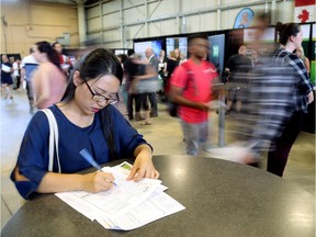 Shelley Qiu was looking for work at the Agriplex job fair last year. (Free Press file photo)