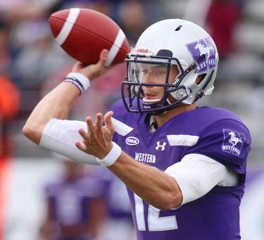 Chris Merchant of the Western Mustangs passes early in their game against the McMaster Marauders at TD Stadium in London, Ont. on Saturday September 8, 2018. 
The Mustangs won 44-6 in their home opener.
Mike Hensen/The London Free Press/Postmedia Network