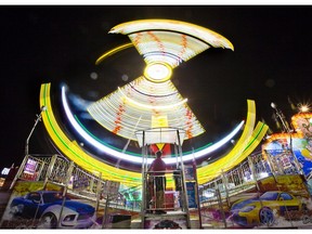 The Banzai Drift ride at Western Fair is photographed with a two-second exposure in this file photo. (Derek Ruttan/The London Free Press)