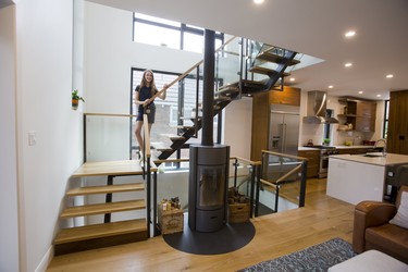 Addison Cammaert’s family is happy with the naturally lit staircase, a favourite focal point of their 134 Ridout St. home, part of the London Home Builders’ Association Parade of Renovations. Derek Ruttan/The London Free Press