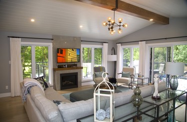 The newly expanded livingroom at 647 Westwood Dr. opens onto a large raised deck,  part of the London Home Builder's Association Parade of Renovations. Mike Hensen/The London Free Press