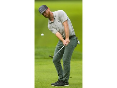 Tyler McCumber, the No. 1 player on the Mackenzie Tour with more than $135,000 in earnings this year, chips onto the 16th green at the Highland Country Club during the first round of the Mackenzie Tour championship on Thursday Sept. 13, 2018.  Mike Hensen/The London Free Press