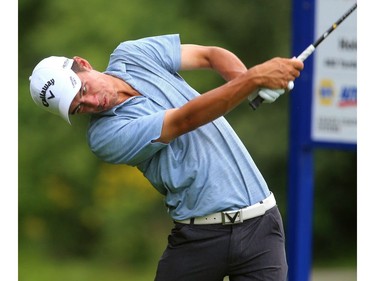 Corey Pereira lashes a driver nearly 300 yards on the 460-yard, par-four 14th hole at the Highland Country Club on Friday. Periera birdied his last two holes of the secind round of the Mackenzie Tour Championship being held at Highland Country Club in London. moving him to 10 under and in a tie for the lead with Jonathan Garrick who shot a three under to go with Thursday's seven under. (Mike Hensen/The London Free Press)