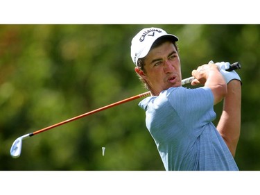 Corey Pereira tees off with his two-iron, hitting it about  "about 260" he grinned, to the corner of the dogleg 16th hole at the Highland Country Club on Friday. (Mike Hensen/The London Free Press)