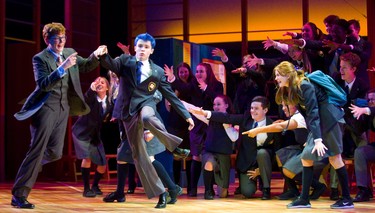 Bradley Amesse playing the lawyer Lonnie Wynn dances with Devon Dixon playing Marc Hall in Grand Theatre's High School Project production of Prom Queen: The Musical (Mike Hensen/The London Free Press)