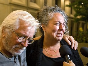 Cindy Martin, with her husband Bill cries while talking about her son Dakoda Martin, 21 who was slain in May 2016 by Jeremy Reddick in Victoria Park in London on Wednesday. (Mike Hensen/The London Free Press)