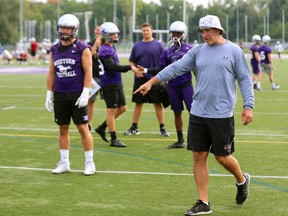 Defensive coordinator Paul Gleason does a walk through with his starters at practice on Thursday. Gleason's defence will meet a strong Waterloo offence led by QB Tre Ford who is a threat both with his arm and on the run. Mike Hensen/The London Free Press/Postmedia Network