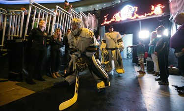 Goaltender Jordan Kooy of the London Knights prepares to lead the team onto the ice for their first game of the season against the Windsor Spitfires at Budweiser Gardens  on Friday Sept. 21.  Mike Hensen/The London Free Press