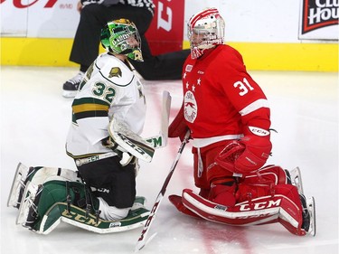 Old teammates catching up at the red line during warmup, Joseph Raaymakers of the Knights chats with old teammate Matthew Villalta of the Soo Greyhounds before their game at Budweiser Gardens on Friday Sept. 28, 2018.  Mike Hensen/The London Free Press