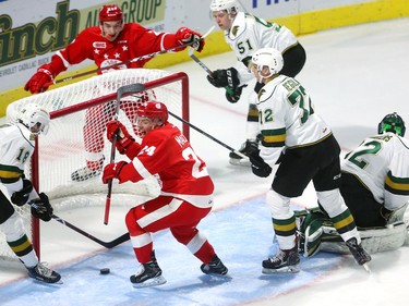 Cole MacKay of the Soo Greyhounds celebrates after his powerplay goal opened the scoring in their game against the London Knights at Budweiser Gardens on Friday Sept. 28.  The puck trickled through Joseph Raaymakers' pads and was an easy put in for MacKay who scored twice in the first period. Mike Hensen/The London Free Press