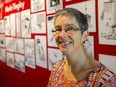 Amber Lloydlangston, curator of regional history at Museum London, says the late London Free Press editorial cartoonist Merle (Ting) Tingley was remarkable for his gentle humour. An exhibit featuring his life and work runs until late January at Musuem London.  (Mike Hensen/The London Free Press)