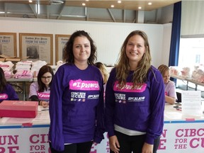 Meghann Geddis, centre, and Stacey Mitchell are volunteer directors for London's CIBC Run for the Cure Sunday.  (DAN BROWN, The London Free Press)
