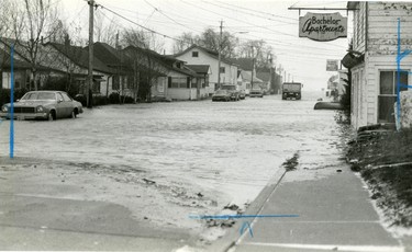 Waters of Lake Erie flood the streets of Port Stanley, flooding not only homes but also the village's water treatment plant, 1985. (London Free Press files)