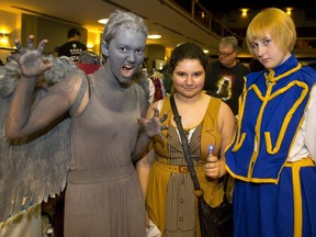 Hannah Couto as a Weeping Angel and Trinity Couto and Megan Gibbs were at the Forest City Comicon at Centennial Hall, 2014. (MIKE HENSEN, The London Free Press File photo)