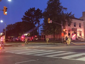 London firefighters at the scene of a fire on Ridout Street that damaged a building in London's so-called "bankers row." JONATHAN JUHA/THE LONDON FREE PRESS