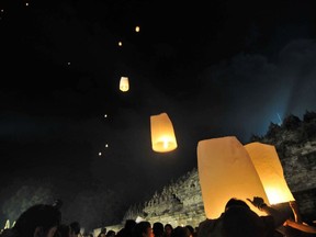 The City of Stratford is considering a ban on the sale of flying lanterns -- small, paper, hot-air balloons fueled by an open flame -- as seen here in a photo of an Indonesian relgious celebration in 2011. AFP PHOTO / CLARA PRIMA