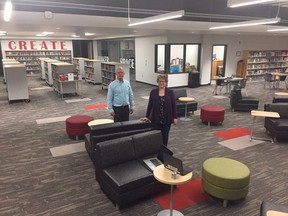 Teacher librarians Elisabeth Pellmann Webb and Ken Baldwin show off the new library at Saunders secondary school. HEATHER RIVERS/The London Free Press