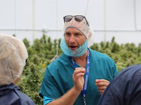 WeedMD chief executive Keith Merker speaks to guests touring the company's Strathroy greenhouse on Thursday, Aug. 6, 2018. The Aylmer-based marijuana producer has secured a supply deal with Ontario's government-run cannabis retailer, the Ontario Cannabis Store. (DALE CARRUTHERS / THE LONDON FREE PRESS)