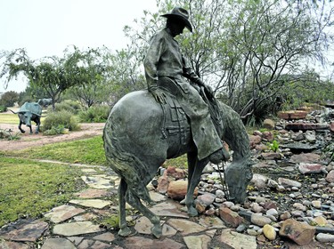 The National Ranching Heritage Center in Lubbock, Texas features almost 50 historical structures from the state's early days of ranching including 14 bronze sculptures of life-sized cowboys and steer ÔroamingÕ the grounds.
BARBARA TAYLOR/THE LONDON FREE PRESS
Lubbock, Texas