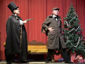 Jamie Cottle as Moriarty and D'Arcy Irvine as Sherlock Holmes. (Photo by Ross Davidson)