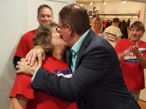 Chatham-Kent mayor-elect Darrin Canniff and his wife Christine share a celebratory kiss on election night. (Trevor Terfloth/The Chatham Daily News)