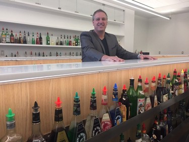 James Smith, chair of the tourism, hospitality and culinary arts school of Fanshawe College, shows off the mixology room at the downtown campus. HEATHER RIVERS/THE LONDON FREE PRESS