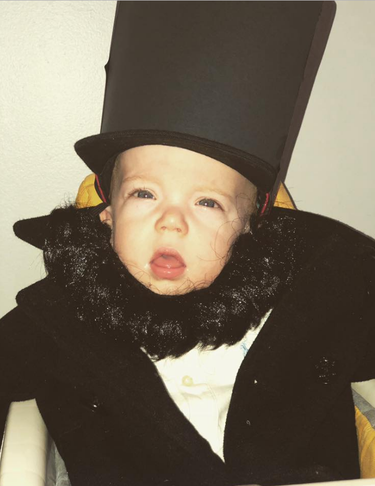 Little Lincoln is dressed up as his famous U.S. namesake from four score and 170 years ago.