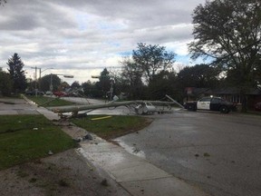 Police in London and Middlesex County are searching for a suspect who evaded police and crashed into two hydro poles in Dorchester Saturday afternoon.