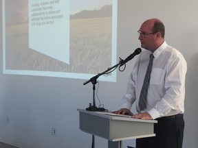 Regional HIV/AIDS Connection executive director Brian Lester, co-chair of the London-Middlesex Community Drug and Alcohol Strategy steering committee, unveils key recommendations from the report Tuesday. Jennifer Bieman/The London Free Press