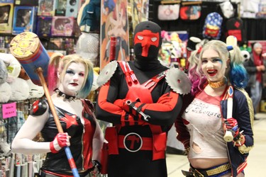 Becky Wright, left, Mike Kaye, centre and Thea Turner say they spent nearly three hours getting into costume for the London Comic Con. The three-day event, now in its fifth year, drew a big crowd to the Agriplex building at the Western Fair over the weekend. DALE CARRUTHERS / THE LONDON FREE PRESS