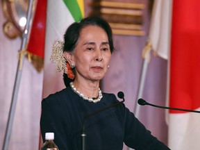 Myanmar's State Counsellor Aung San Suu Kyi delivers her speech during the joint press remarks with Japanese Prime Minister Shinzo Abe following their bilateral meeting at the Akasaka Palace state guest house in Tokyo Tuesday, Oct. 9, 2018. (Toshifumi Kitamura/Pool Photo via AP) ORG XMIT: TKSK311