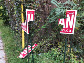 What's left of a damaged Josh Morgan campaign sign in west-end Ward 7.